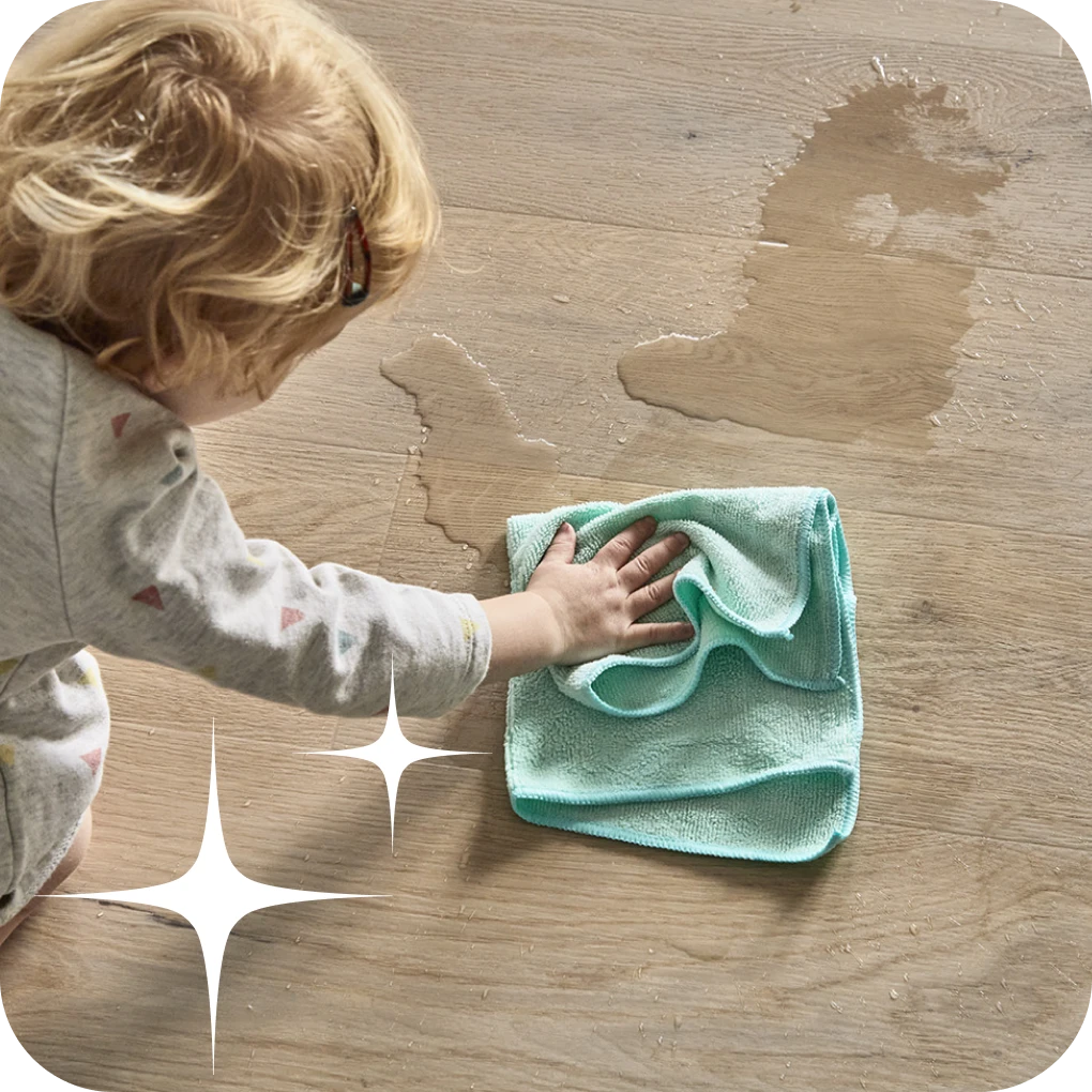 Baby cleaning vinyl flooring