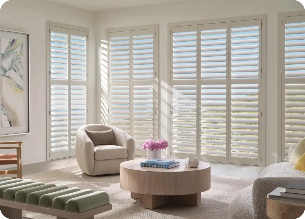 Shutters in a bright sitting room | Lloyd's Carpets & Draperies